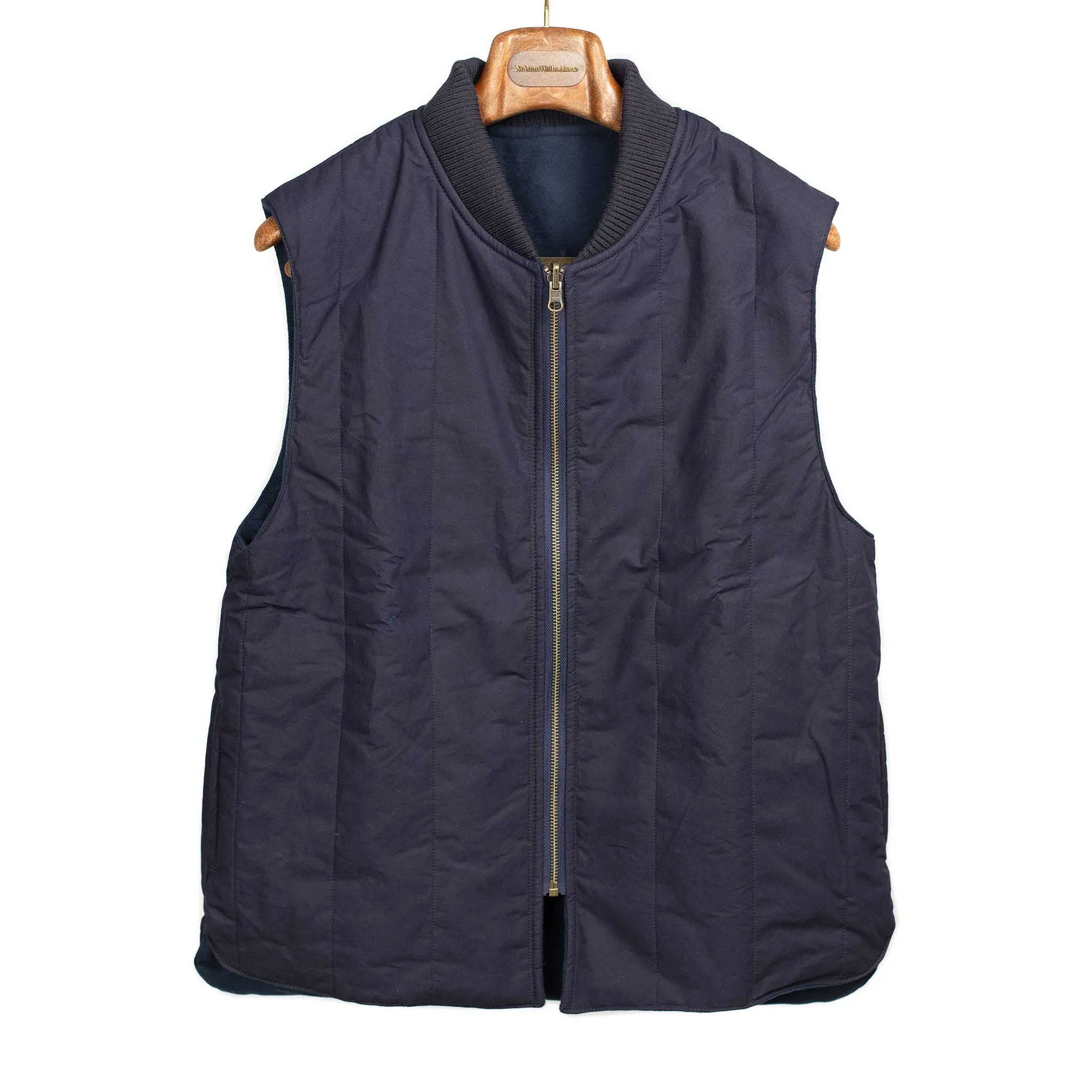 Reversible wadded gilet in navy moleskin and dry wax cotton