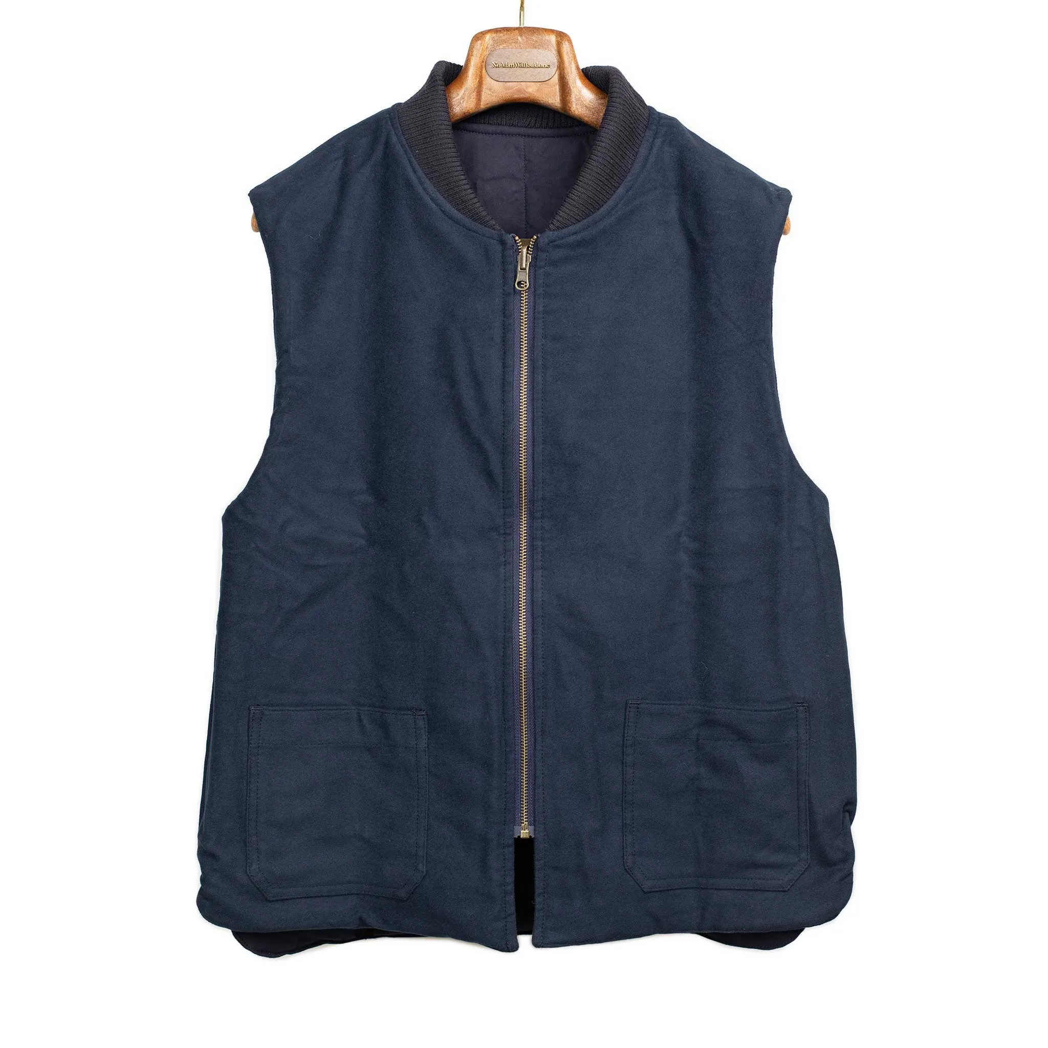 Reversible wadded gilet in navy moleskin and dry wax cotton