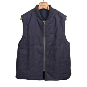 Reversible wadded gilet in navy moleskin and dry wax cotton