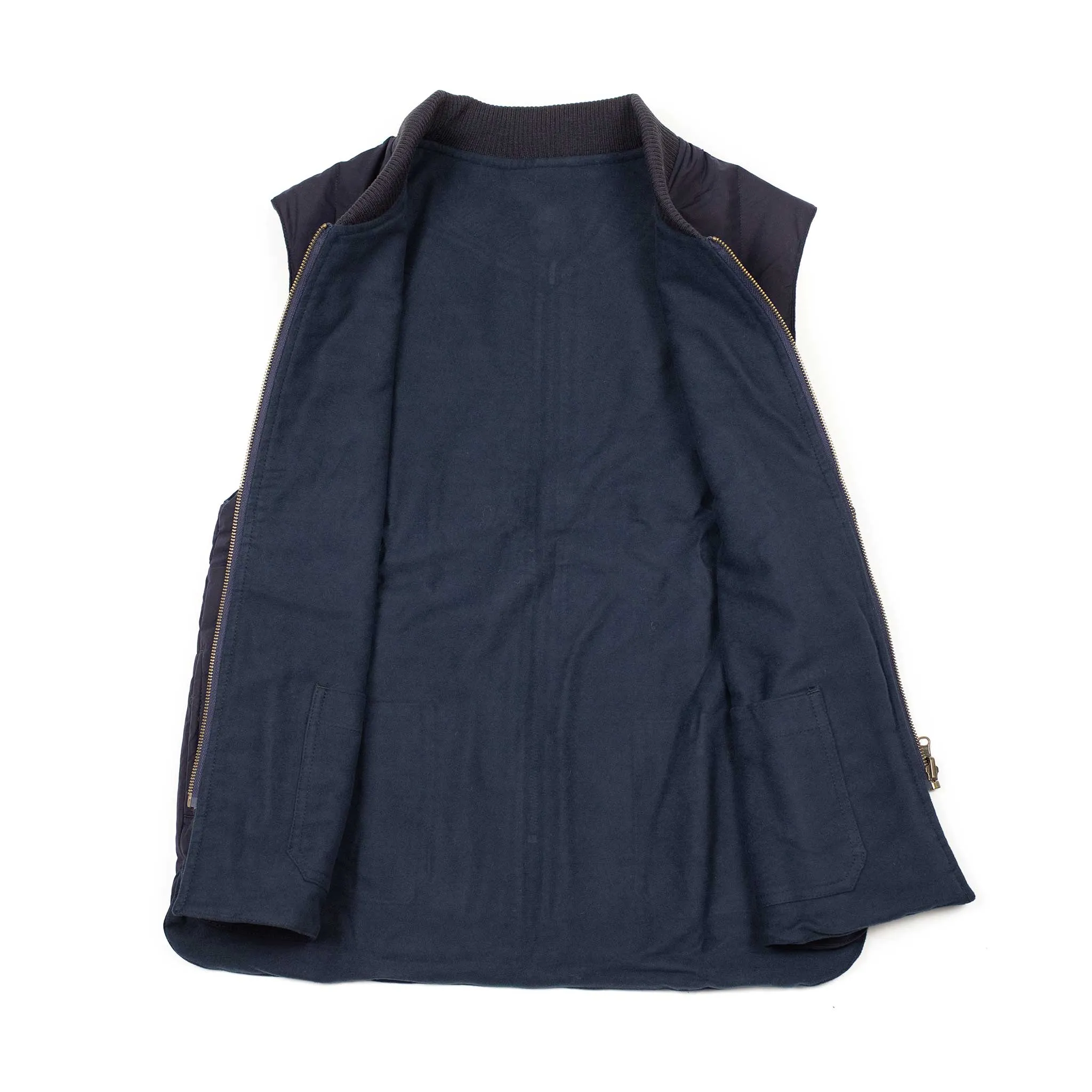 Reversible wadded gilet in navy moleskin and dry wax cotton